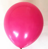 Vibrant Hot Pink and Black Balloon Array - Chic and Daring Atmosphere for Lively Festivities!